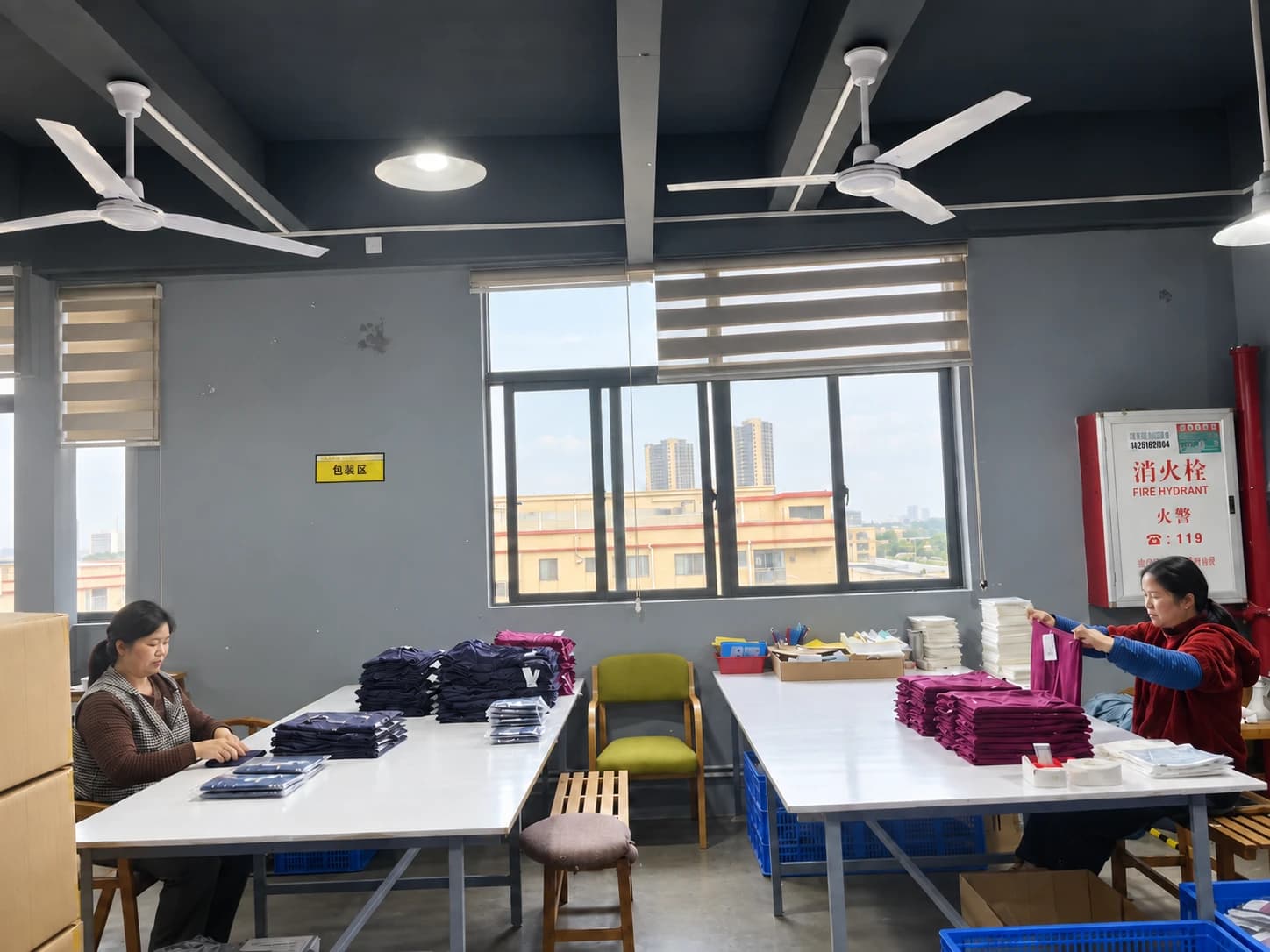 Staff folding and packing underwear at the packaging workstations